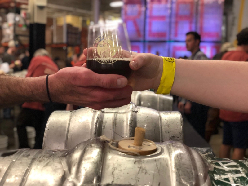 A beer handoff from the 2019 Yards Brewing Company Real Ale Invitational