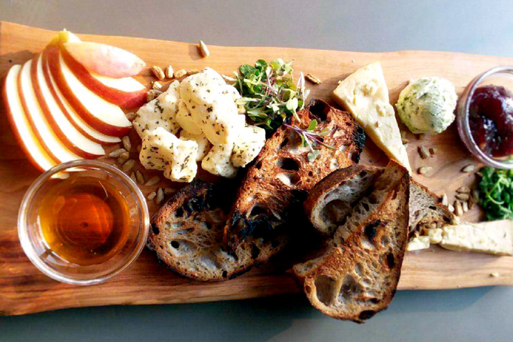 A cheese plate from the innovative farm to table menu at Hidden River Brewing Company