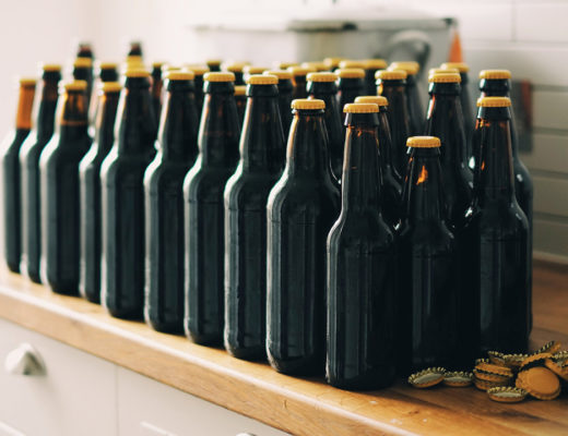 Why We Brew - A few freshly capped home brew bottles